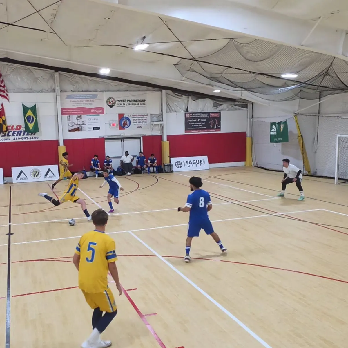 Tyler shooting for the Kings during a League 1 Futsal game